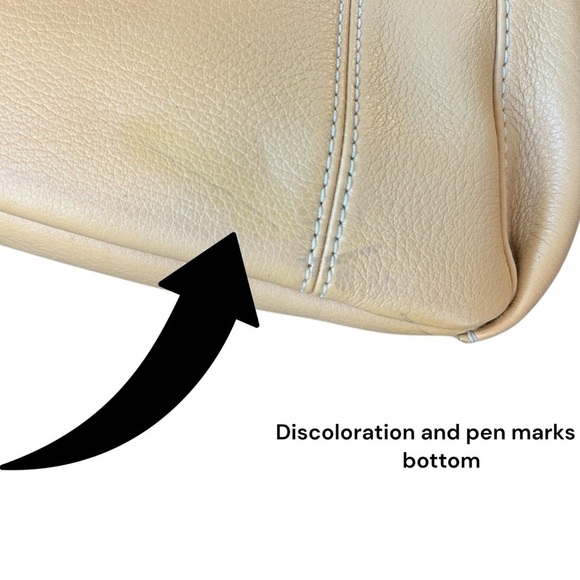 Dooney and Bourke Bag . Medium sized. Has imperfections . - Picture 6 of 17